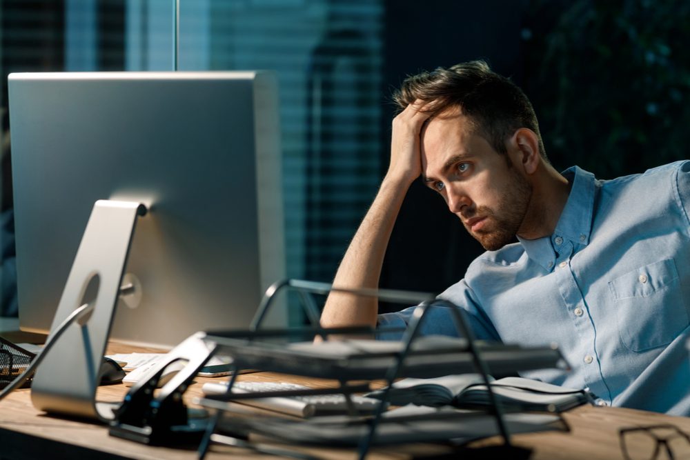 frustrated man at computer