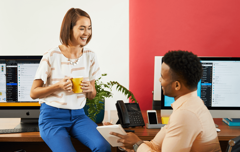 two employees share ideas