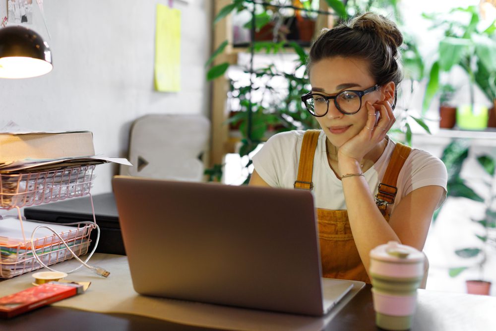 picture of woman on computer at home