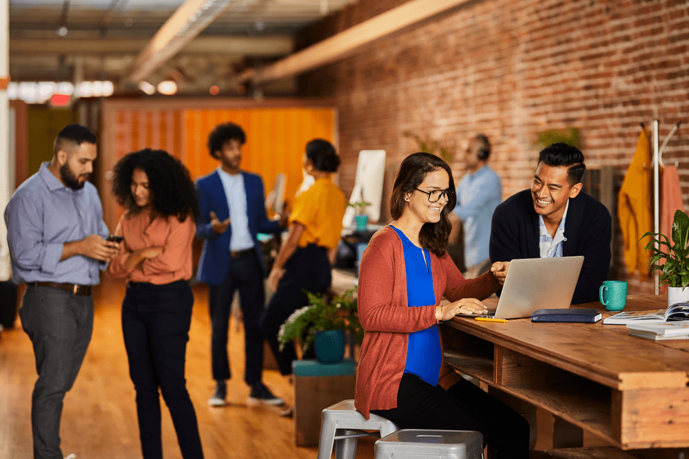 office workers on mobile and computer
